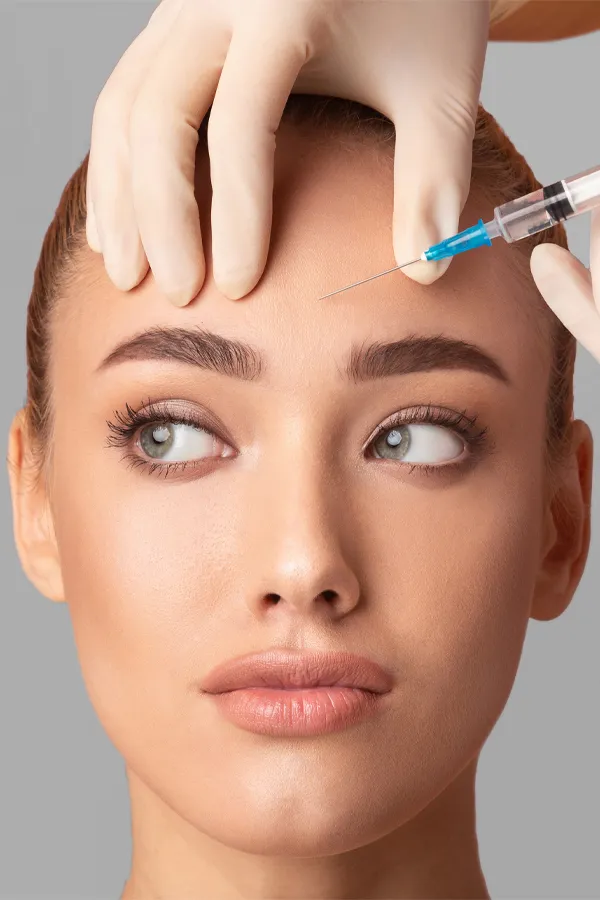 Botox-Treatment Close up of a woman with receiving a Botox injection in her brow from Tanya Zboril, NP of TBT Medical in Kitchener-Waterloo.