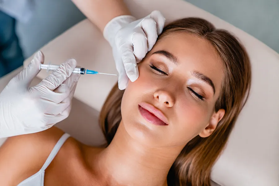 Dysport-Facial-Injections-Clinic A woman receiving facial injections. Get Dysport facial injections from Tanya Zboril, NP of TBT Medical in Kitchener-Waterloo.