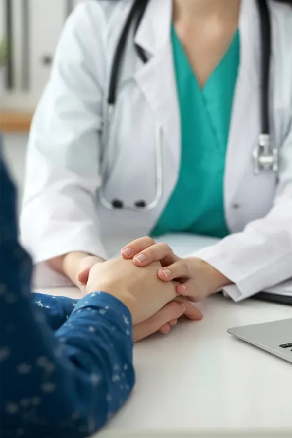 Hair-Loss-Treatment Image of a cheerful man with a bright smile and curly hair against a natural landscape. Tanya Zboril, NP of TBT Medical provides personalized hair loss treatments in Kitchener-Waterloo.
