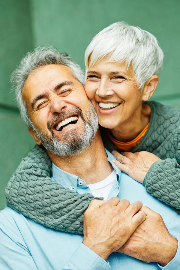 Lipolysis-Weight-Loss-Injections-Treatment A mature couple embrace joyfully. Get Lipolysis weight loss injection treatment from Tanya Zboril, NP of TBT Medical in Kitchener-Waterloo.
